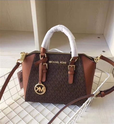 michael kors ciara messenger|Ciara Medium Signature Logo Messenger Bag .